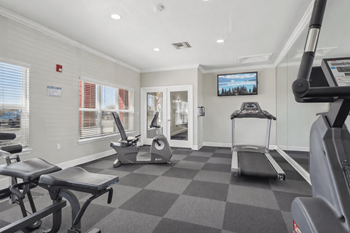 Fitness center with cardio equipment and weights